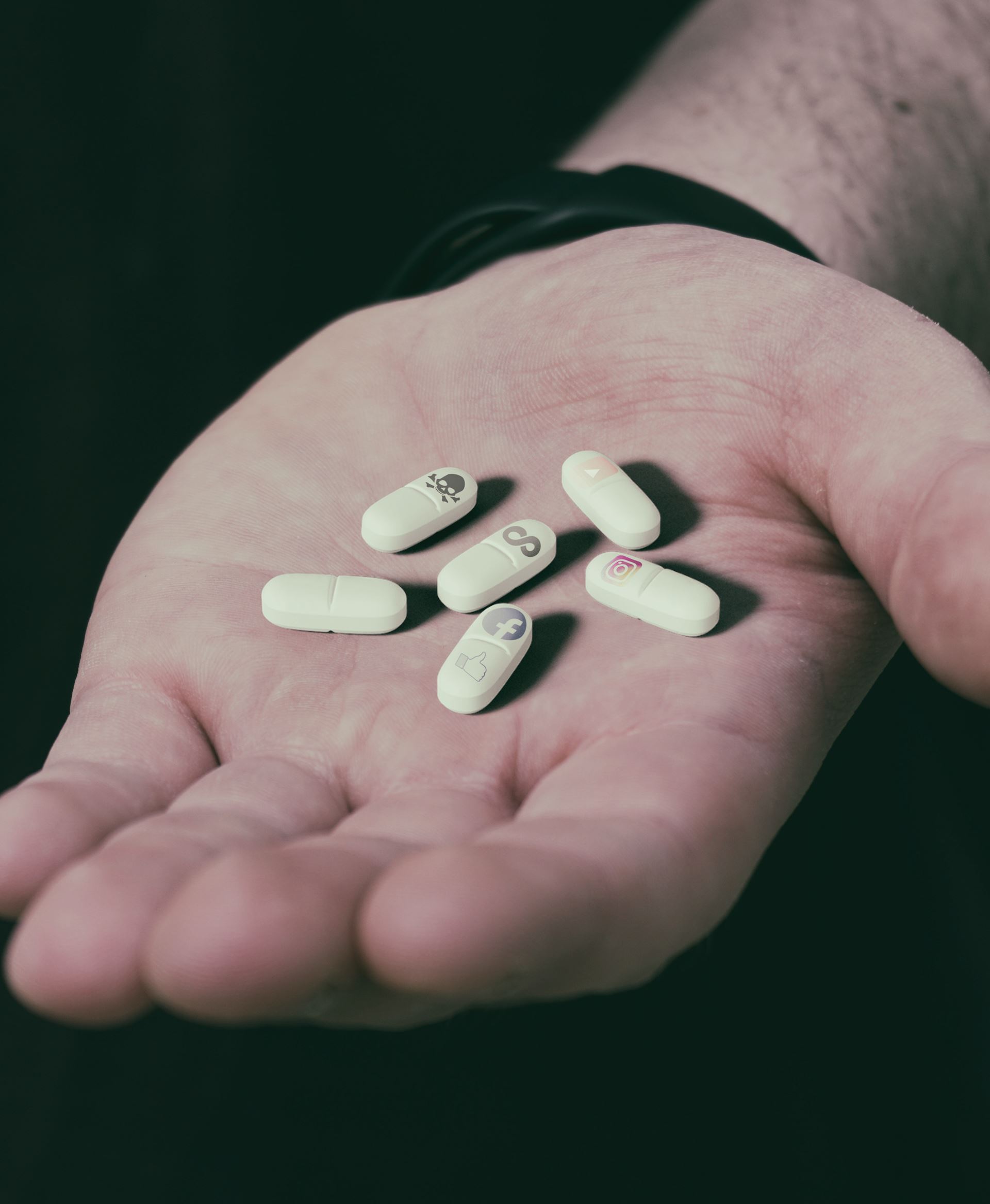 a hand holding medication